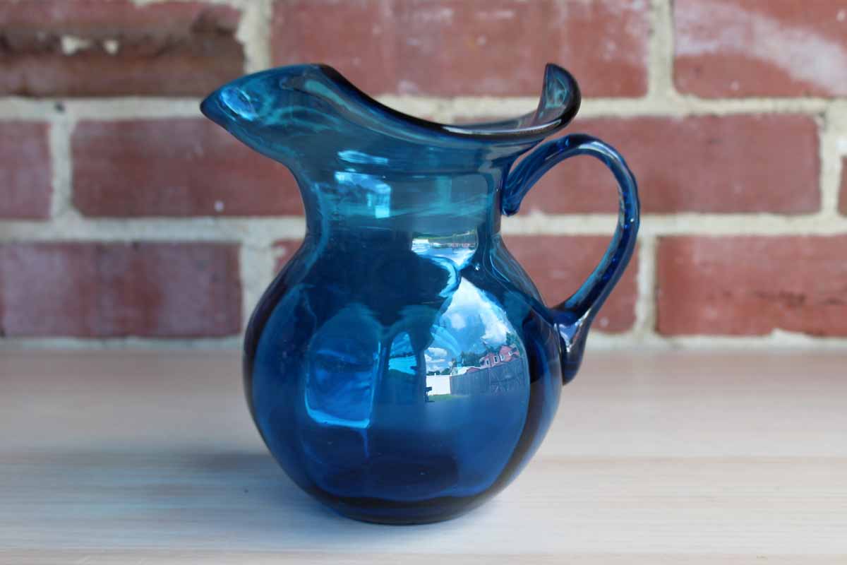 Small Blue Glass Pitcher with Dramatically Flared Rim – The Standing Rabbit